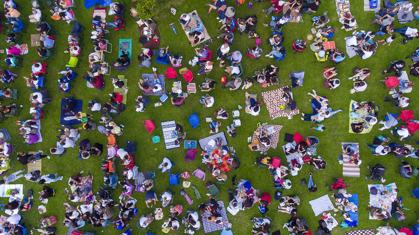 Overhead view of people in a city park on a summer day